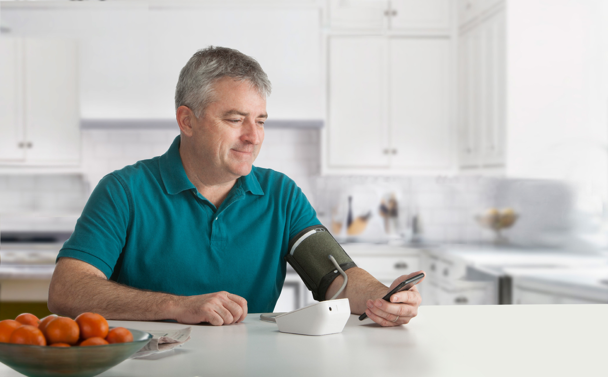 Hypertension_Patrick_HoldingPhone_Kitchen.jpg